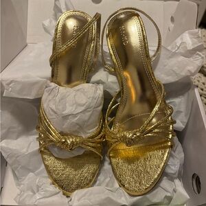 NAKD gold sling back heels NWT